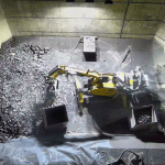 A remotely operated vehicle removing waste